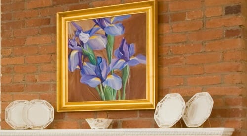 beautiful original art in DC - flowers over the fireplace